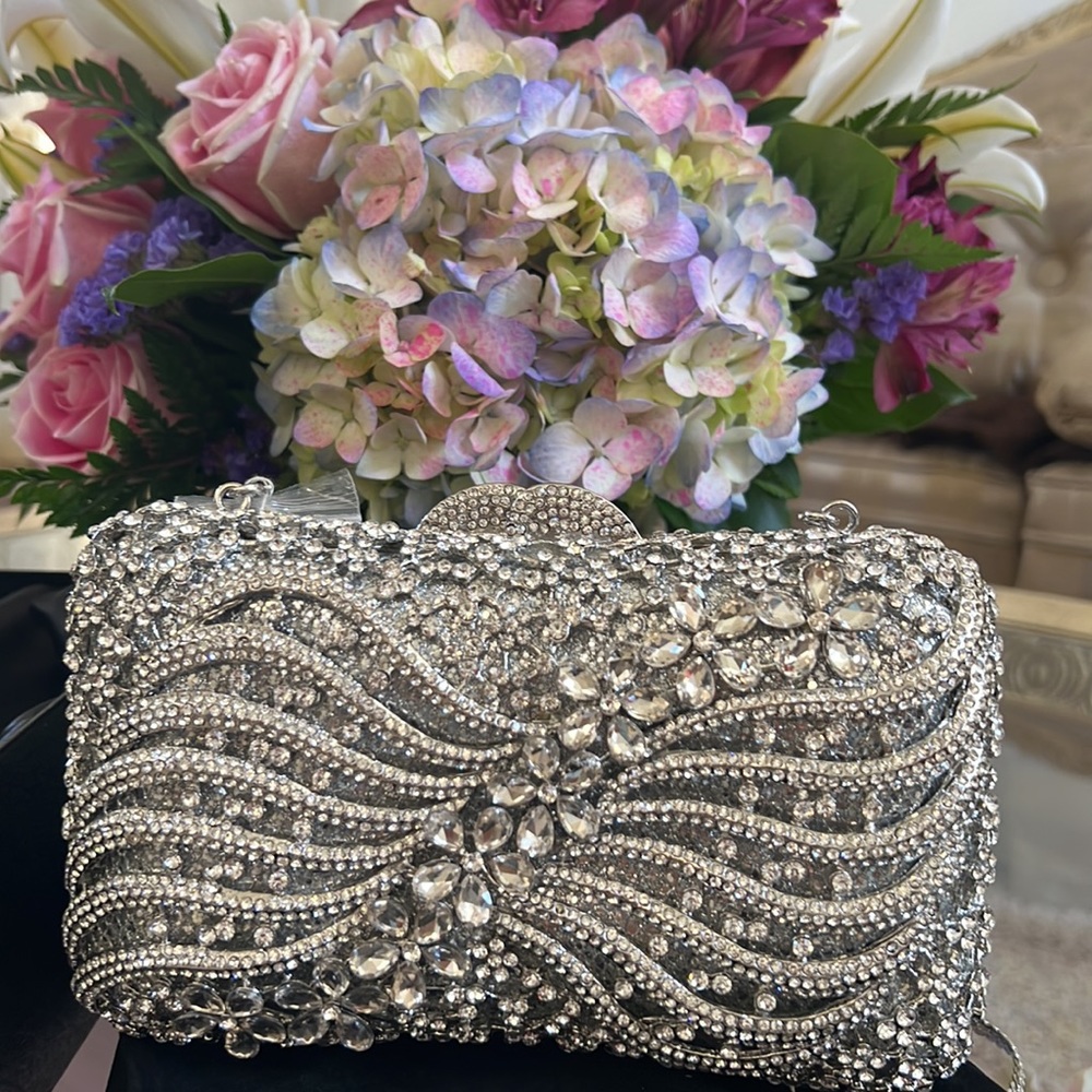 Beautifully made white crystal clutch/hand bag.